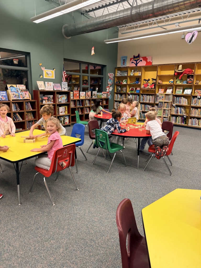 Students working at tables