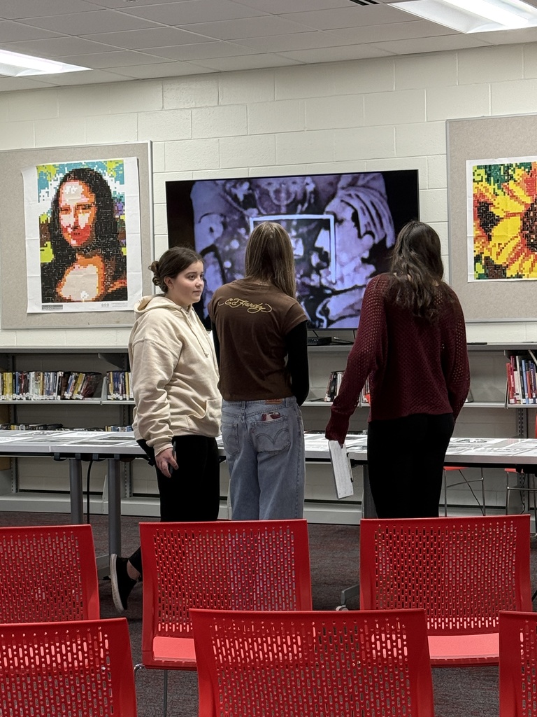 Mrs. Kathy Burns’ and Ms. Susan Sharps’ classes participated in a powerful Gallery Walk after reading Night by Elie Wiesel, exploring WWII and the Holocaust through artifacts, images, videos, music, and artwork.  A special thank-you to Mr. Jim Eccleston for sharing his collection, hosting a station, and taking student questions, and to Mrs. Wrenn Kibler and Mrs. Jessica North for hosting the event in the Library Media Center and helping make this meaningful learning experience possible.