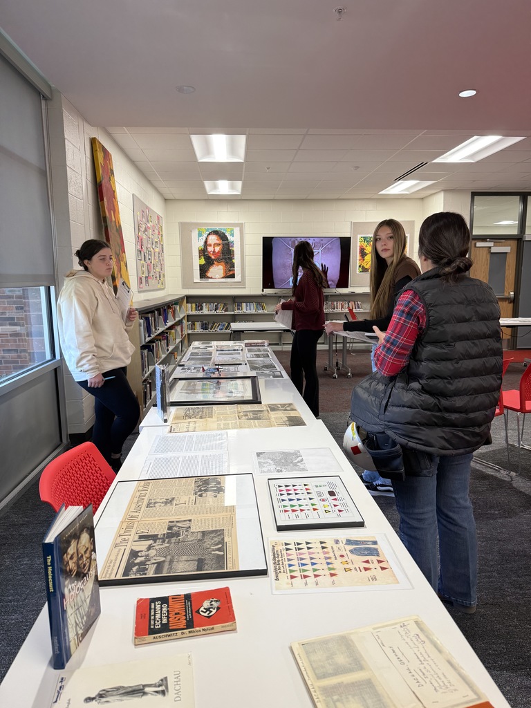 Mrs. Kathy Burns’ and Ms. Susan Sharps’ classes participated in a powerful Gallery Walk after reading Night by Elie Wiesel, exploring WWII and the Holocaust through artifacts, images, videos, music, and artwork.  A special thank-you to Mr. Jim Eccleston for sharing his collection, hosting a station, and taking student questions, and to Mrs. Wrenn Kibler and Mrs. Jessica North for hosting the event in the Library Media Center and helping make this meaningful learning experience possible.