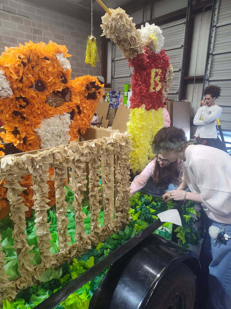 🎨 Behind the Scenes of Hoco Float Building! 🚜✨ What an amazing Homecoming Parade! Before our classes rolled down the street, our students spent hours measuring, decorating, and bringing their creative circus themed ideas to life. Want to know which class takes home the top prize for best float? 🏆 Head out to the Homecoming Game tonight to hear the float contest winners announced at halftime and help us cheer on our Dukes to victory! Drop a comment and tell us which float was your favorite! 👇❤️💛 #GHS #Homecoming2026 #FloatBuilding #DukeNation #GoDukes #GloucesterVA