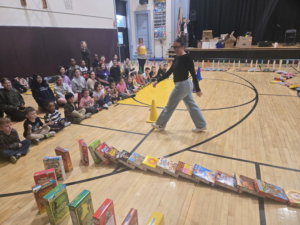 Cereal boxes falling like dominos.
