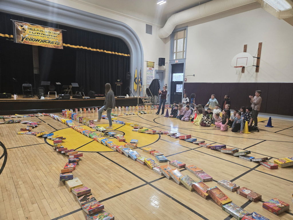 Cereal boxes falling like dominos.
