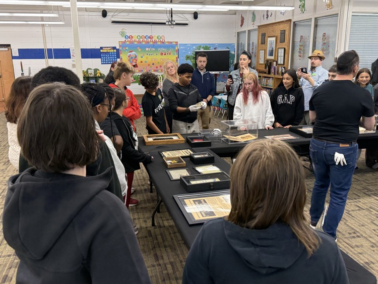 Students up close with artifacts