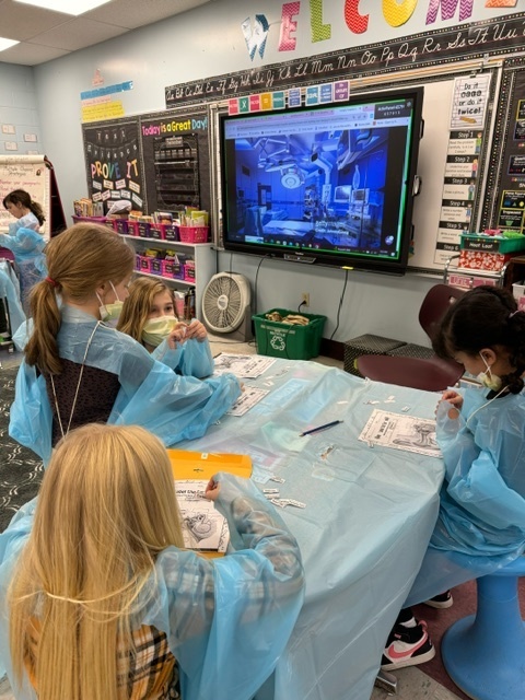 Mrs. VanNostrand and Ms. Walker’s 3rd grade class at Boulevard recently wrapped up a CKLA unit on the human body and skeletal systems. Scholars became surgeons for the afternoon and rotated through surgery stations showing off their skills learned throughout the unit. What a fun learning adventure!