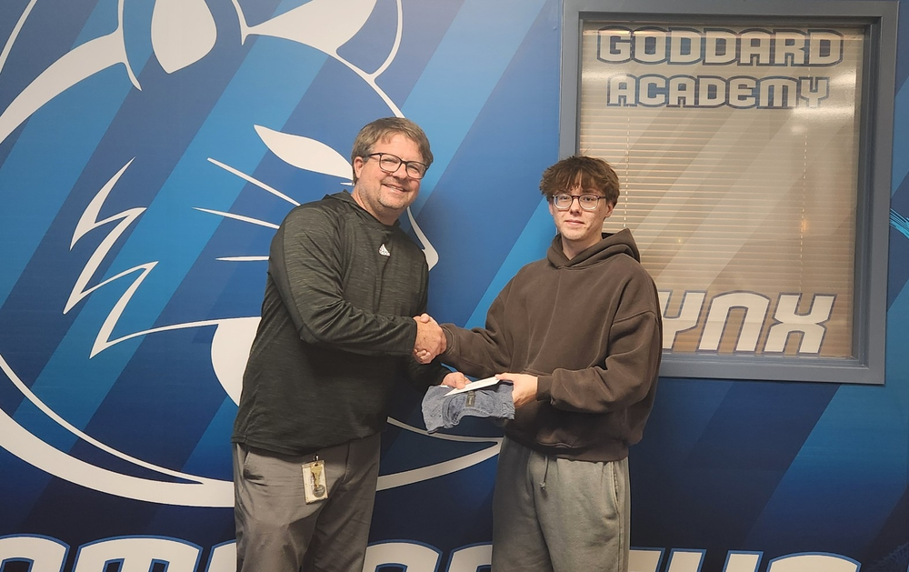 Mr. Gee giving prize to David