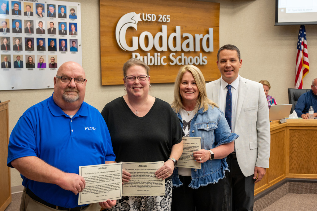 Doug Mann, Rochelle Mann & Pam Cole receive the district Attitude Award