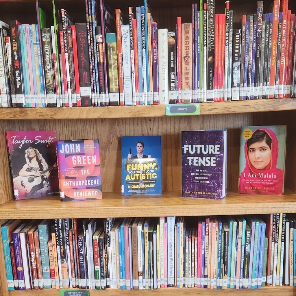 Display of nonfiction books: Taylor Swift; The Anthropocene Reviewed; Funny, You Don't Look Autistic; Future Tense (How We Made AI and How It Will Change Everything; I Am Malala