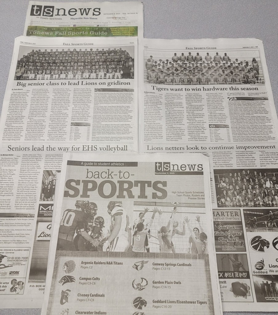 Times-Sentinel Newspaper spread showing various articles covering the Goddard High School Lions and Eisenhower High School Tigers in boys football and girls volleyball