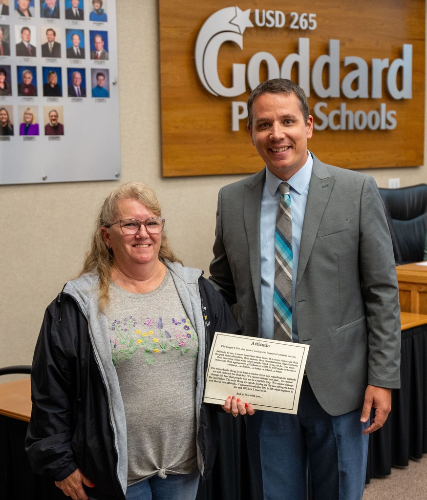 Aretha Place receives the District Attitude Award from the USD 265 Board of Education