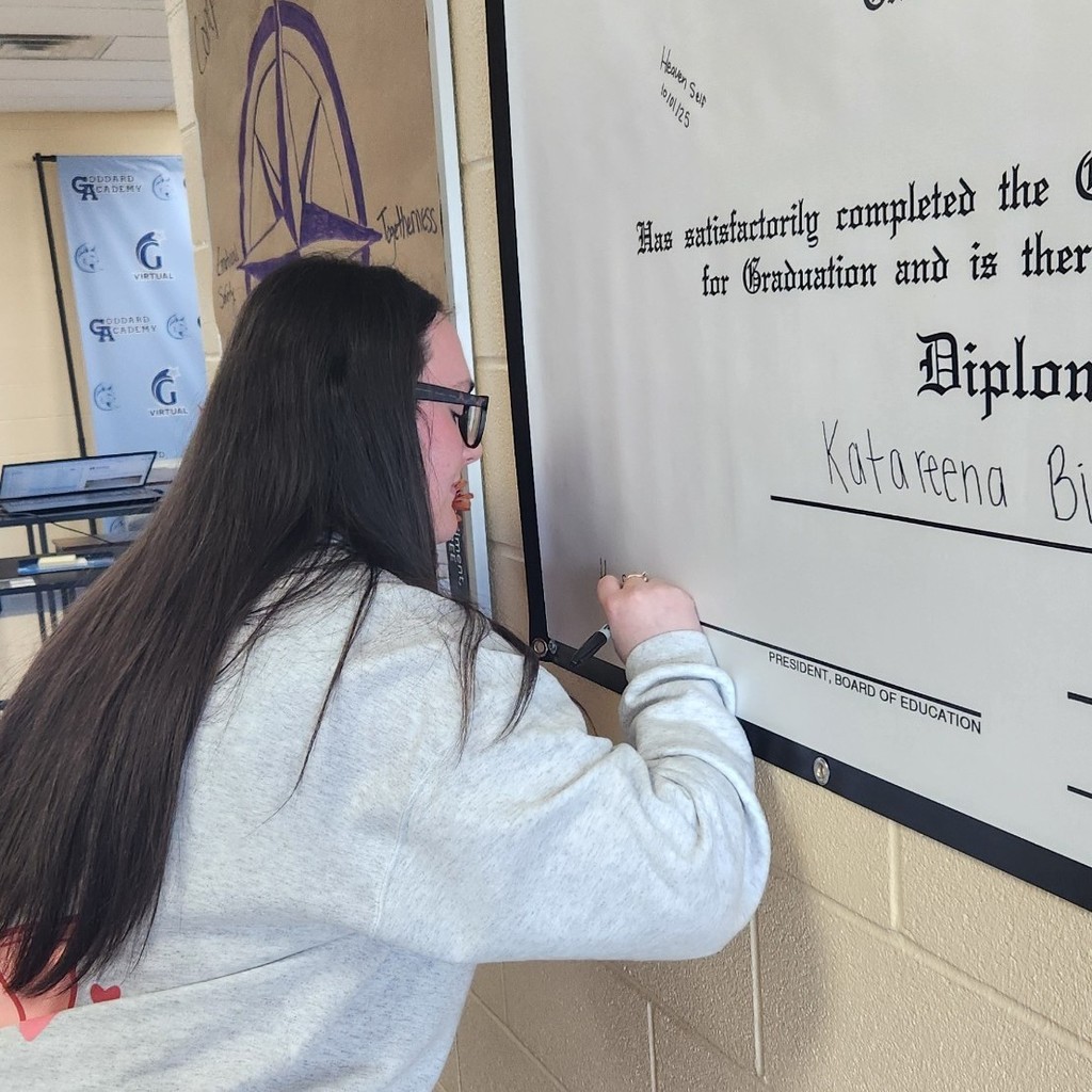 Hope Signing Diploma