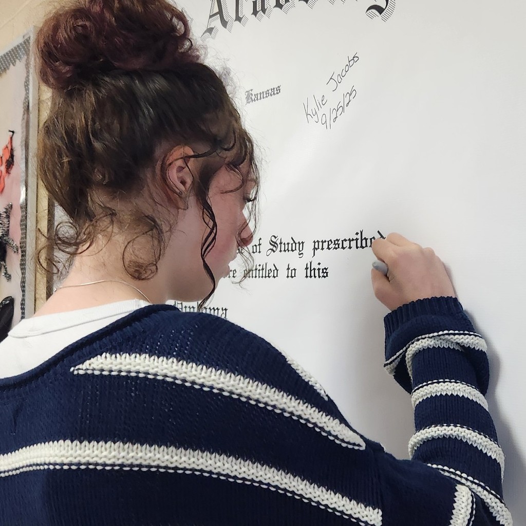 Savannah Signing Diploma