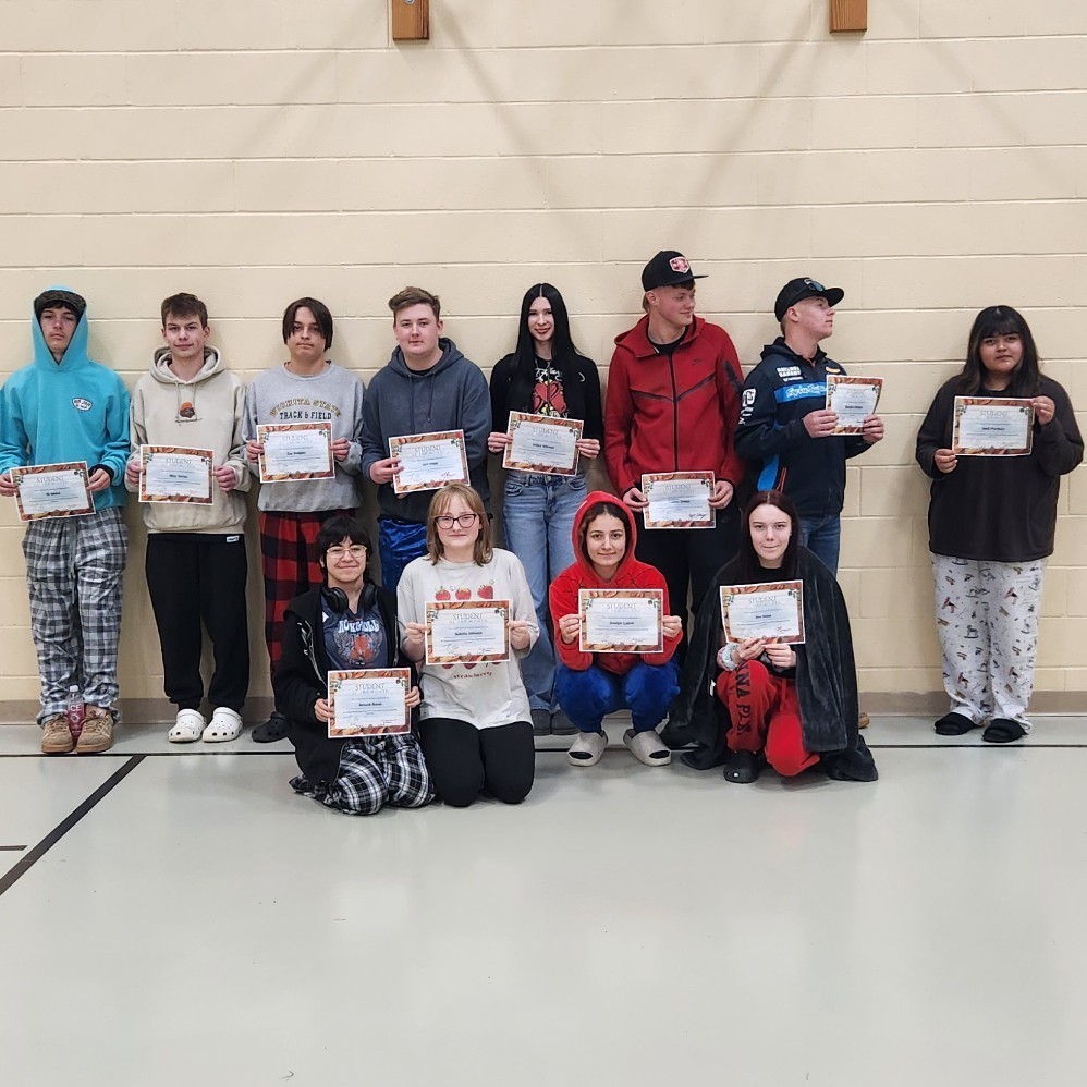 Students in Gym with Certificates