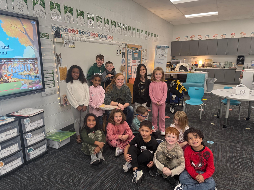 --Today Mrs. Davis, a Marine Veteran, came to our class! She read a story about Veterans and answered some kindergarten questions about how she served our country. Thank you Mrs. Davis!
