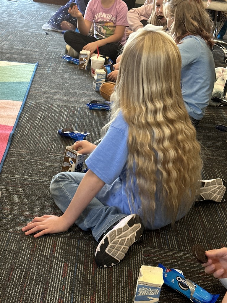 Mrs. Douglass’ class enjoyed their milk, cookies, and read aloud Food Drive reward with Ms. Buresh today!