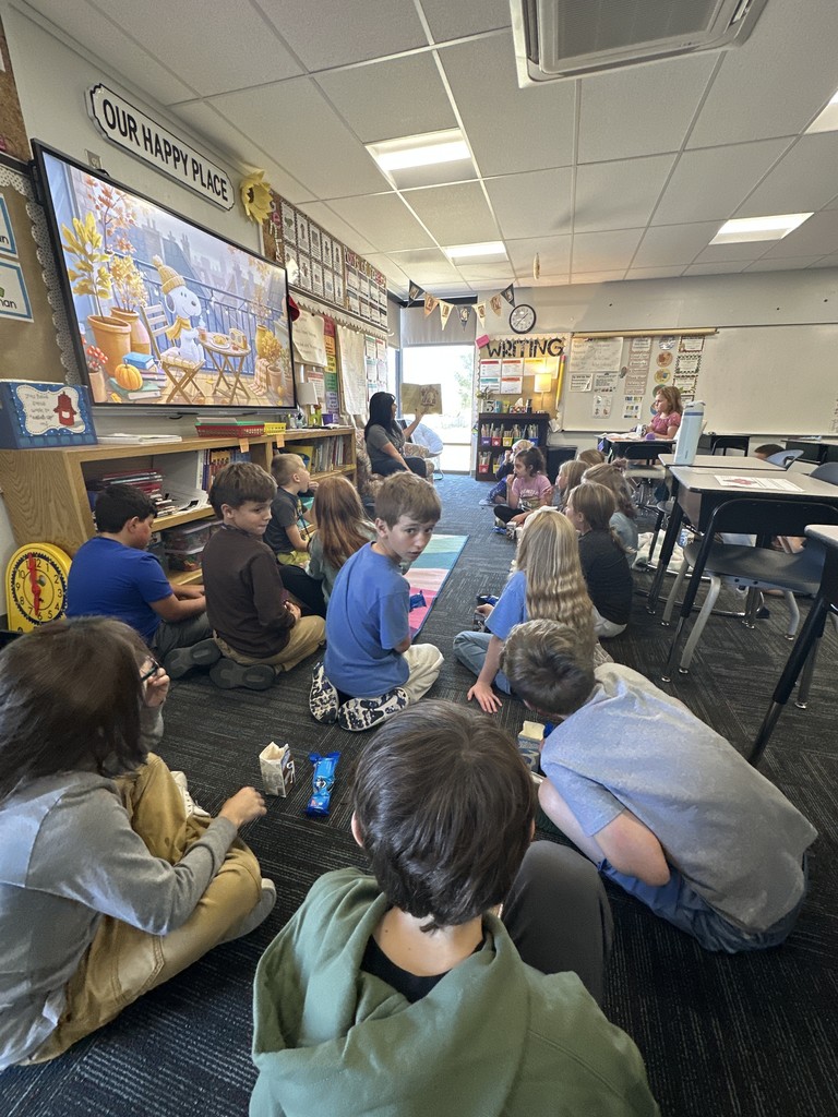Mrs. Douglass’ class enjoyed their milk, cookies, and read aloud Food Drive reward with Ms. Buresh today!