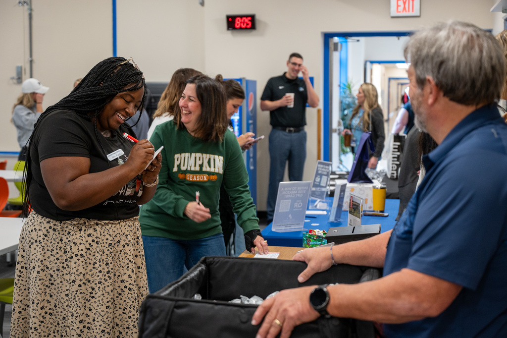 Goddard Education Foundation Trustees serve breakfast to USD 265 staff