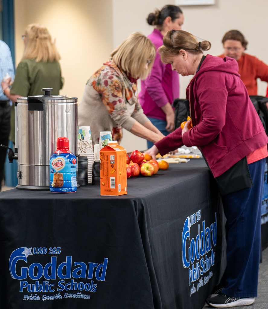 Goddard Education Foundation Trustees serve breakfast to USD 265 staff