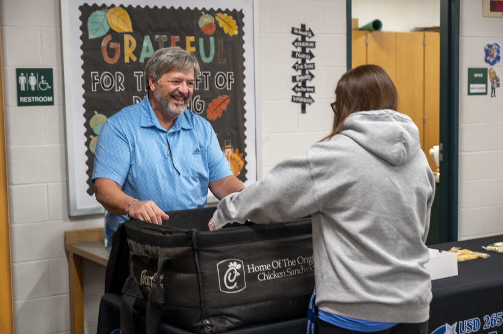 Goddard Education Foundation Trustees serve breakfast to USD 265 staff
