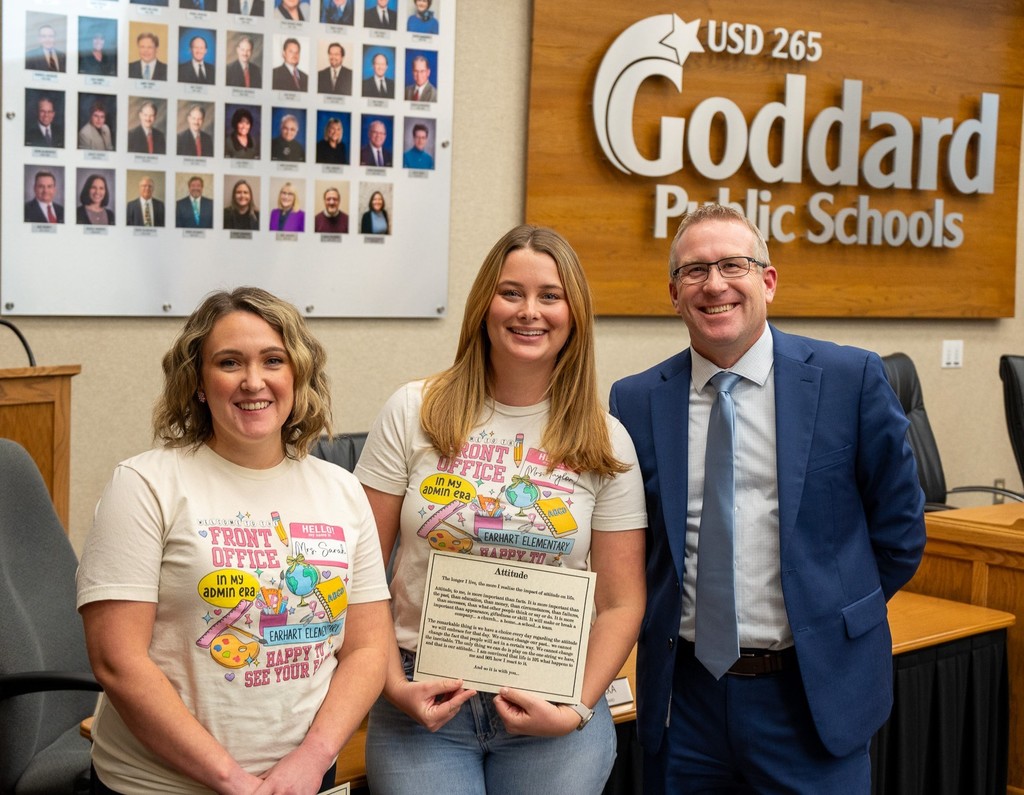 Sarah Smith & Taylor Smith receive the District Attitude Award from the USD 265 Board of Education