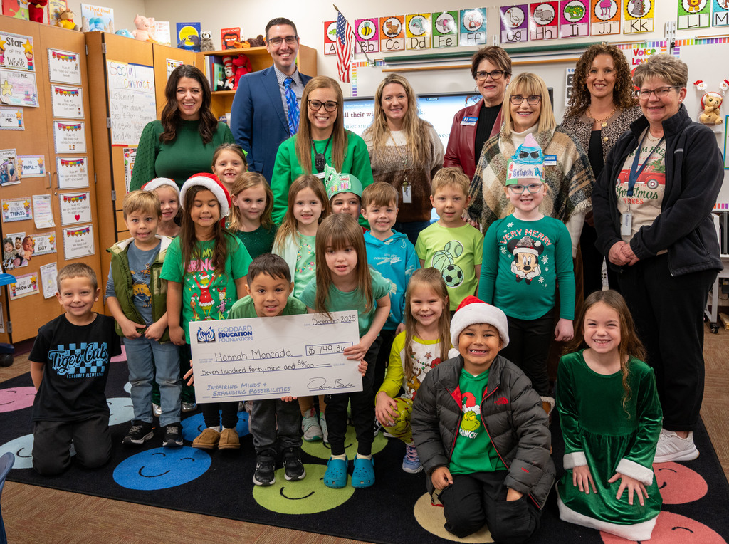 Hannah Moncada accepts an Innovative Teacher Grant check from the Goddard Education Foundation