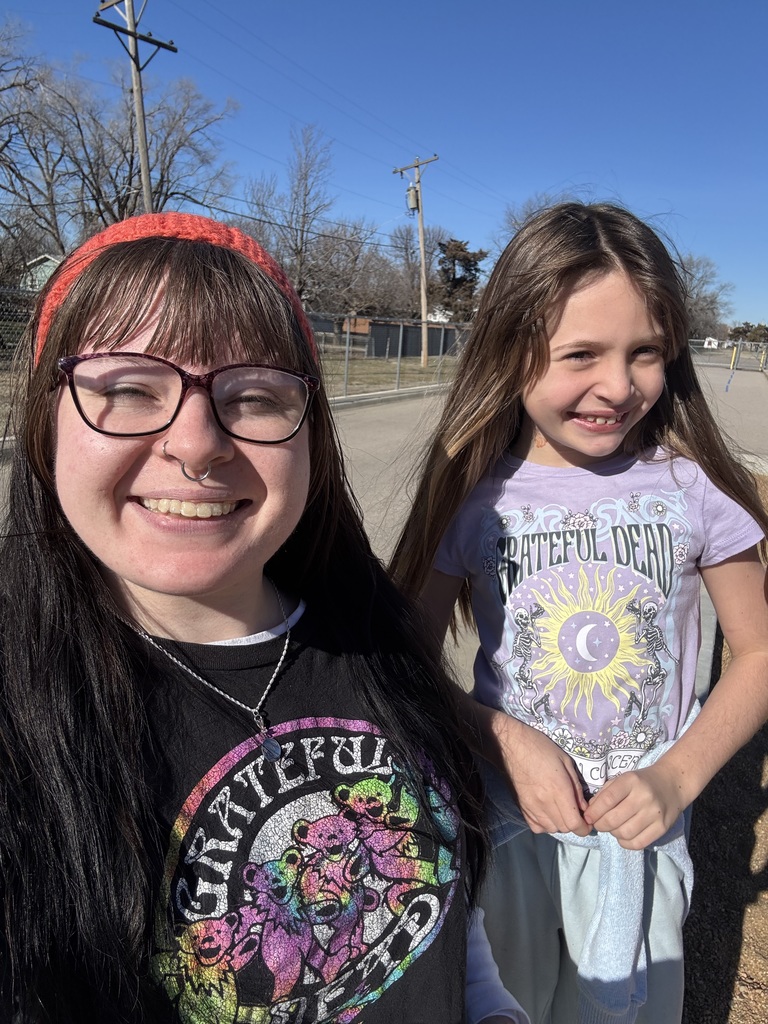 Para and student twinning in Grateful Dead shirt