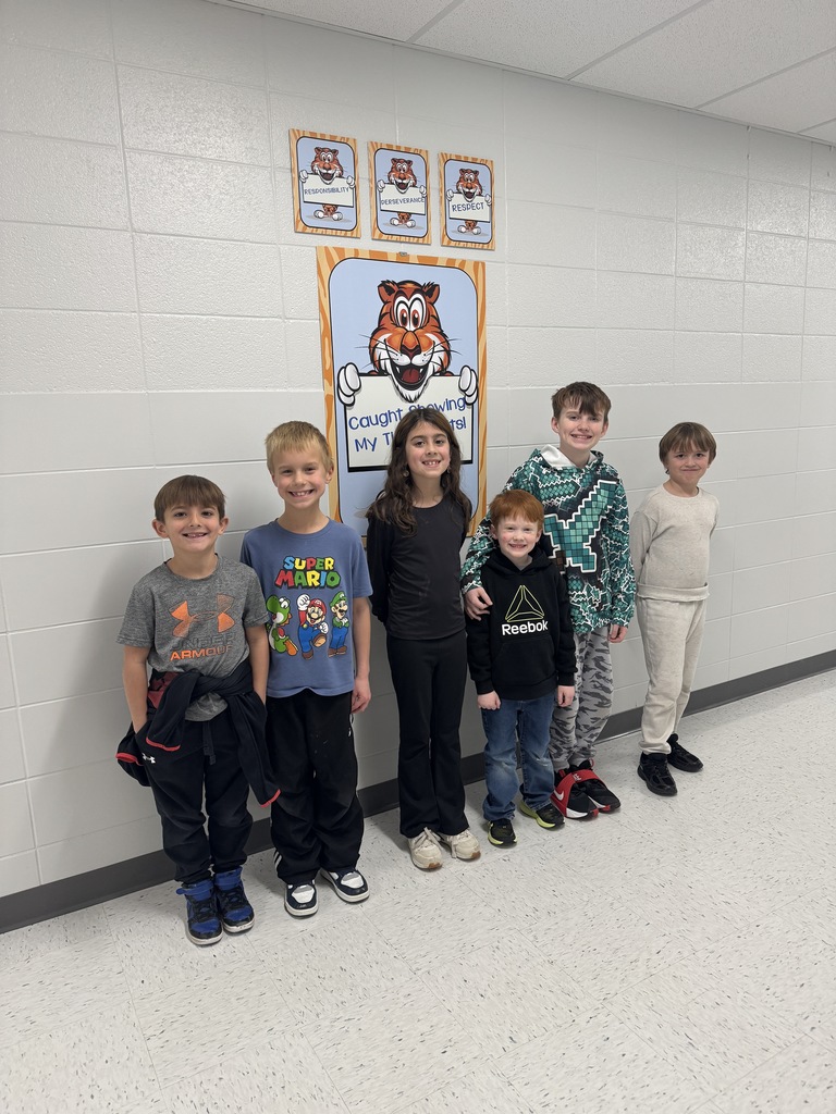 Look at the smiles on this group.  Two days into school and they won the tiger ticket drawing on Tiger Trait Tuesday!  Enjoy your transformable fidget!