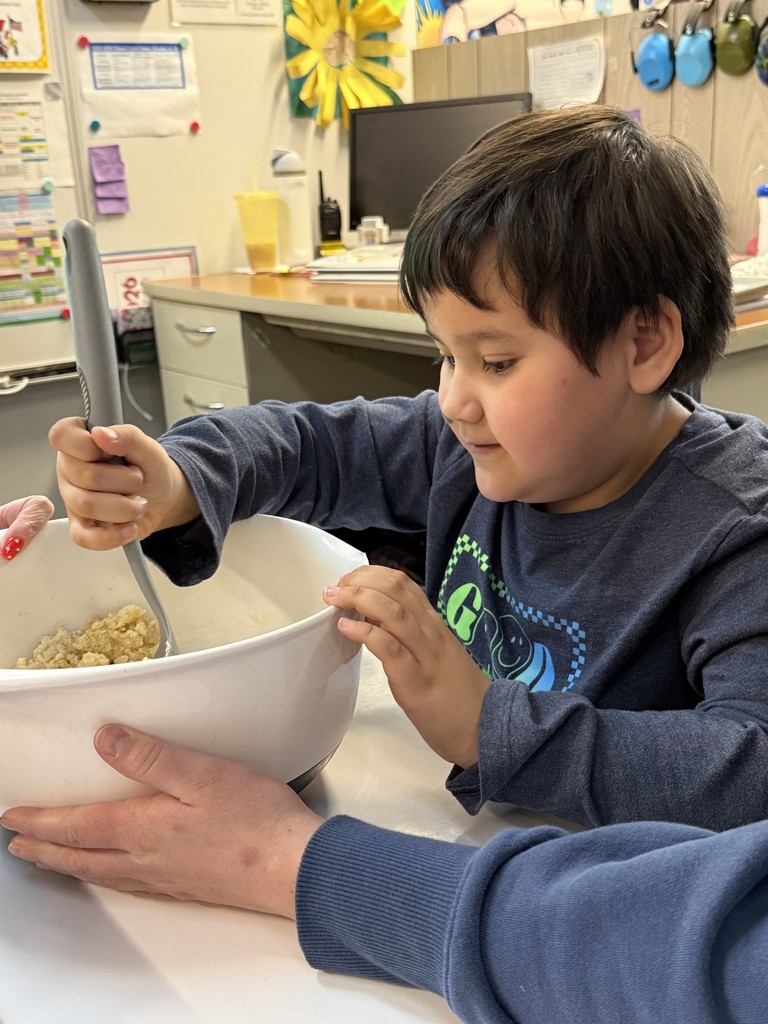 Pictures of V-Day cookie backing in Ms. Shanda’s room today 
