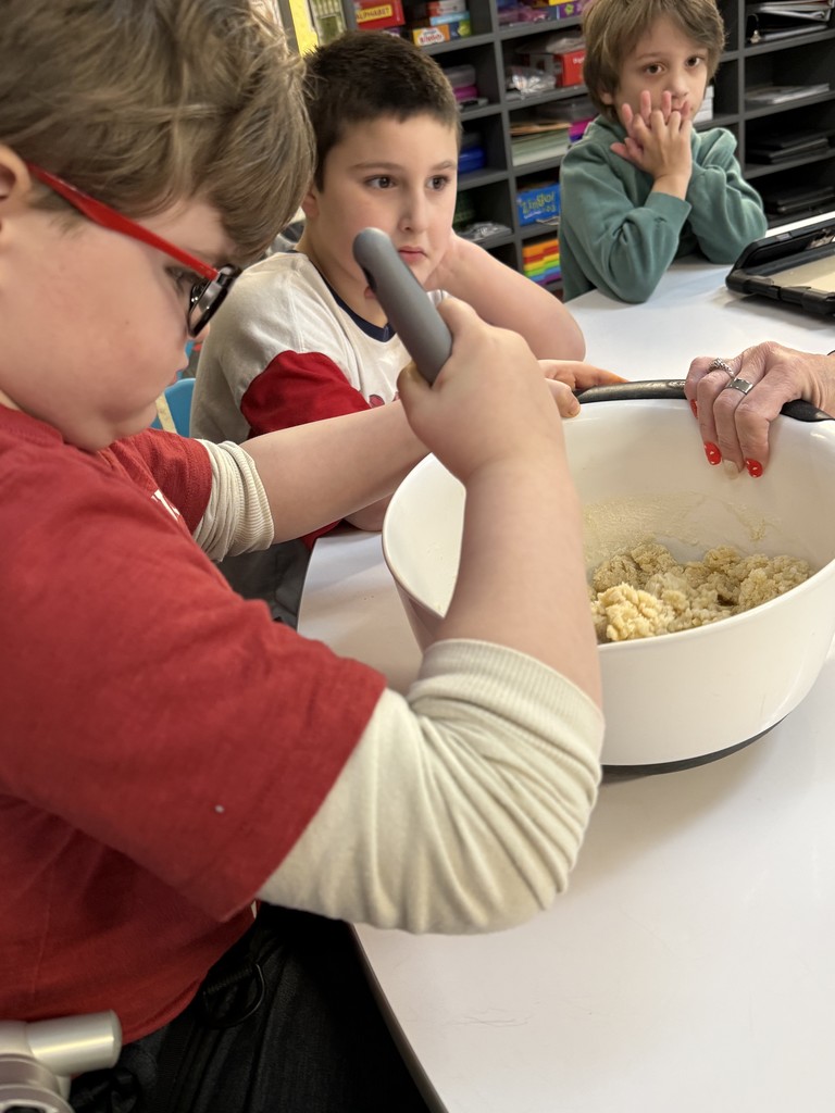 Pictures of V-Day cookie backing in Ms. Shanda’s room today 