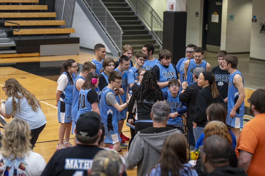 The EHS Unified Basketball team huddles up following a recent game