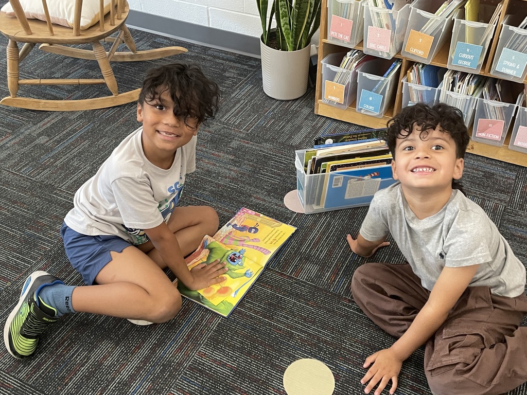 Mrs. H.’s class enjoyed some quiet time reading books enjoying the sunshine. 