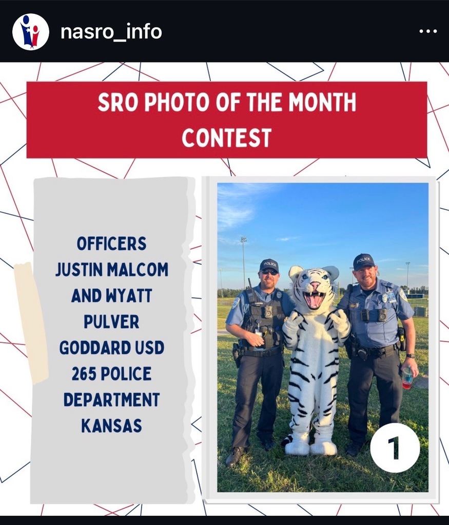 background: black and white and red with text boxes and a photo of Officers Malcom & Pulver; Text: SRO photo of the month contest, officers justin malcom and wyatt pulver goddard usd 265 police department kansas