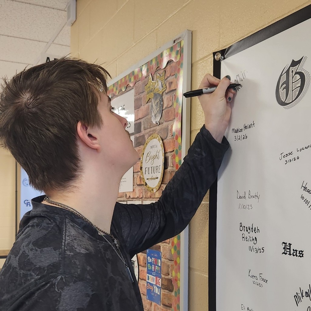 signing diploma