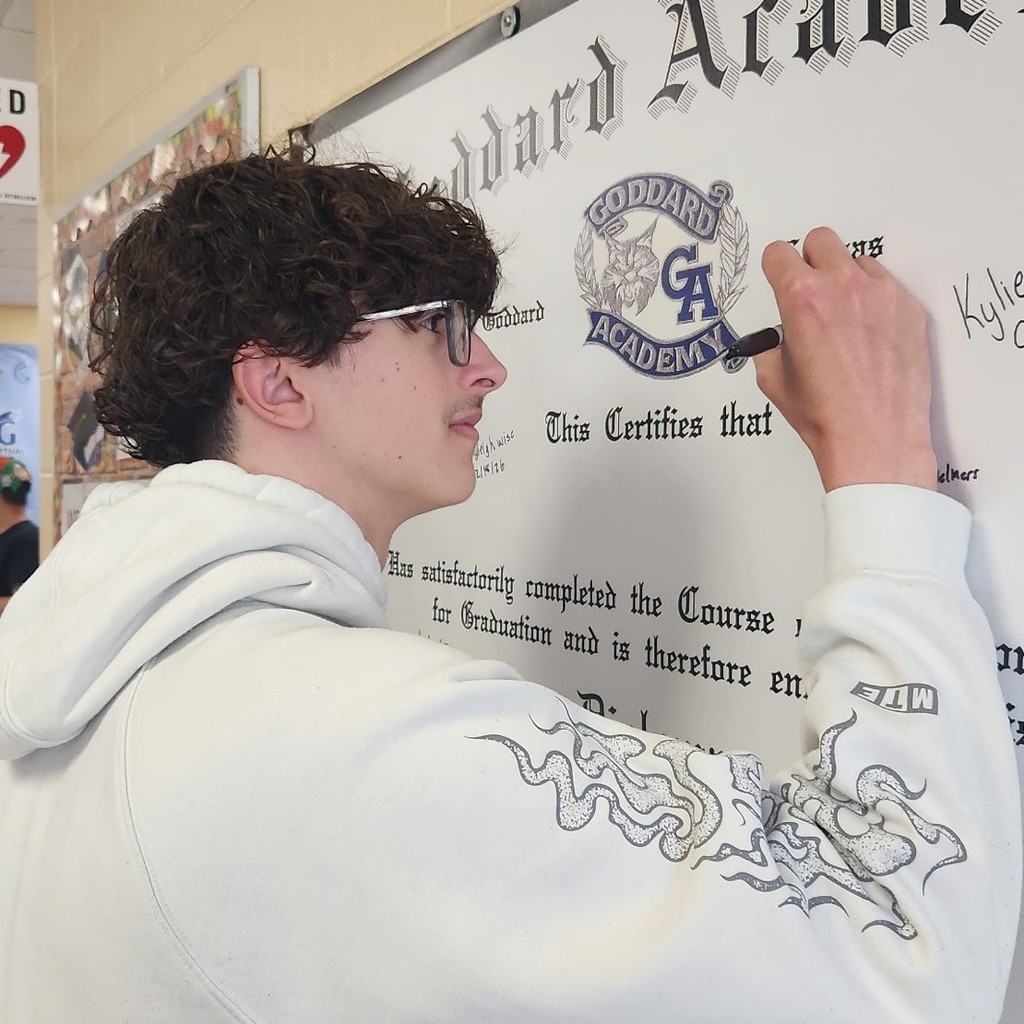 Signing diploma
