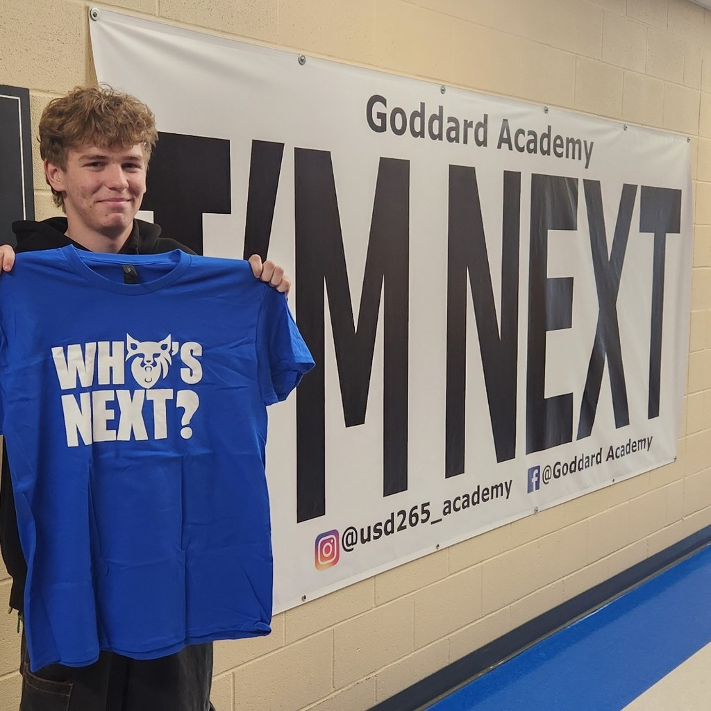 "Who's Next" shirt with "I'm next" banner