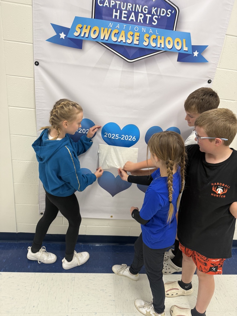 Kids showing off our new heart for our CKH award 