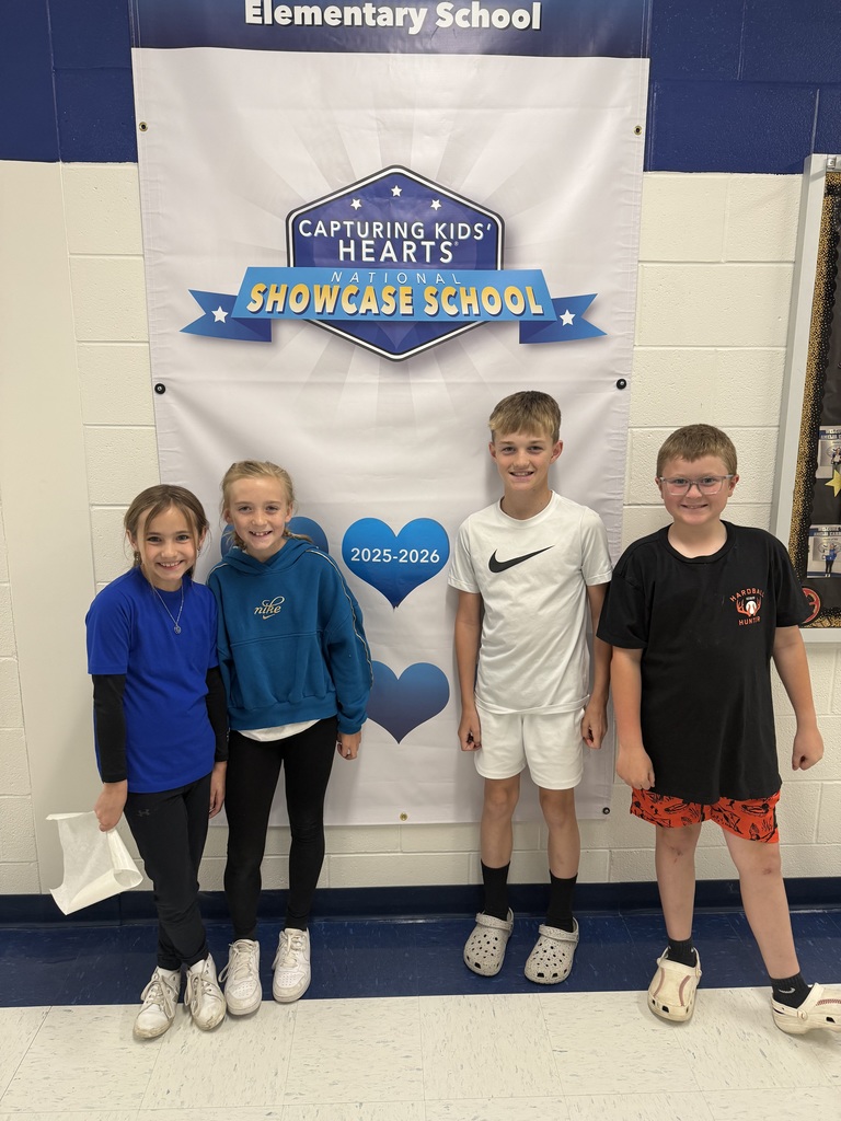 Kids showing off our new heart for our CKH award 