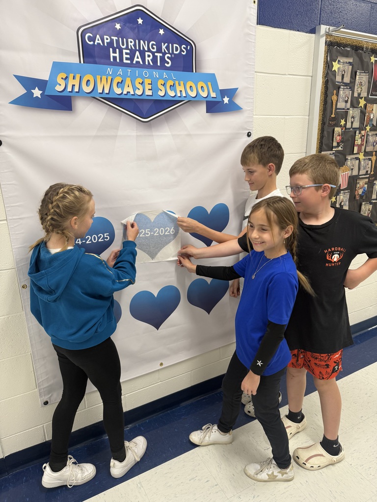 Kids showing off our new heart for our CKH award 