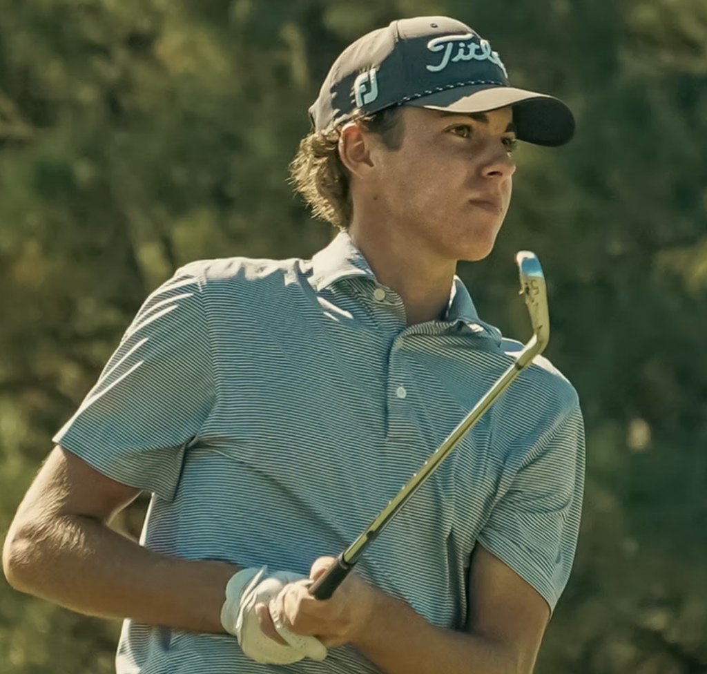 background:  green trees and photo of Luke Springer with a golf club in hand
