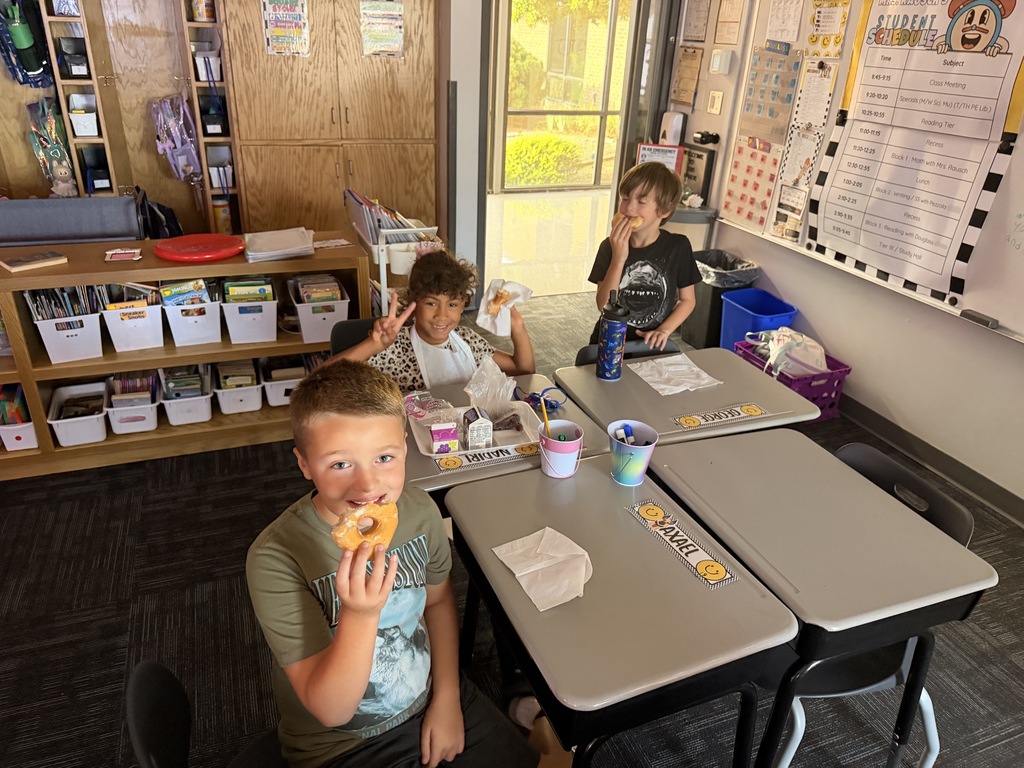 Mrs. Rausch's class earned donuts for showing Tiger Traits
