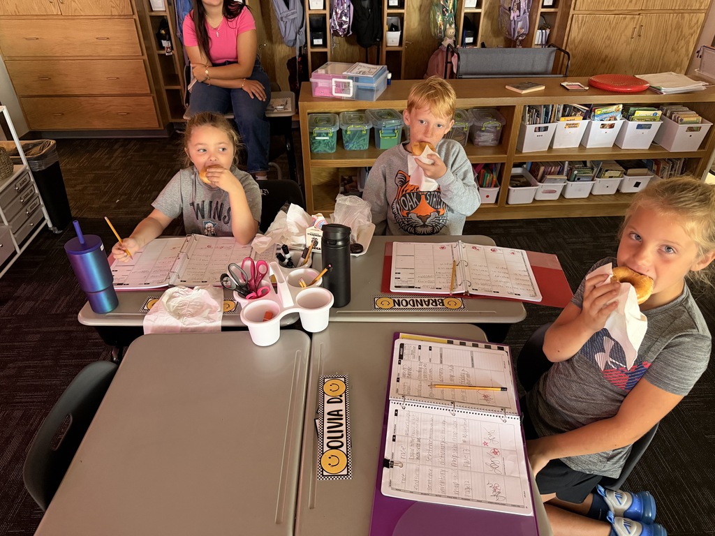 Mrs. Rausch's class earned donuts for showing Tiger Traits