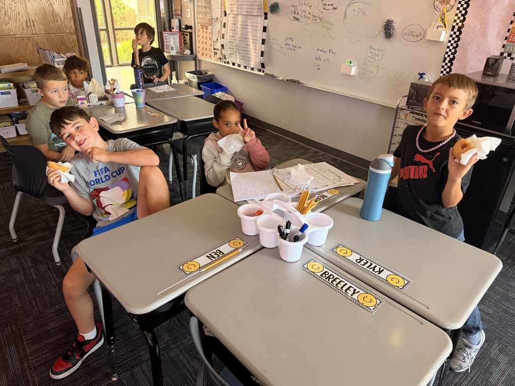 Mrs. Rausch's class earned donuts for showing Tiger Traits