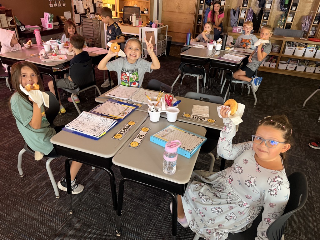 Mrs. Rausch's class earned donuts for showing Tiger Traits