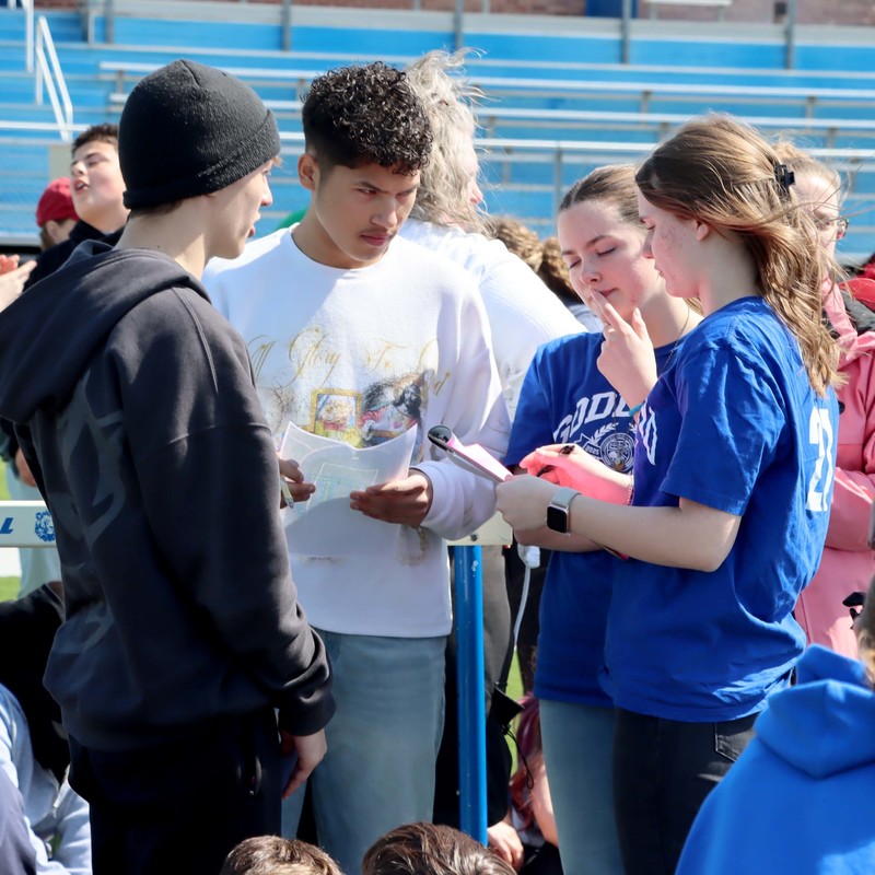 Many logistics workers were required  to place students and get an accurate count for the world record breaking effort. 