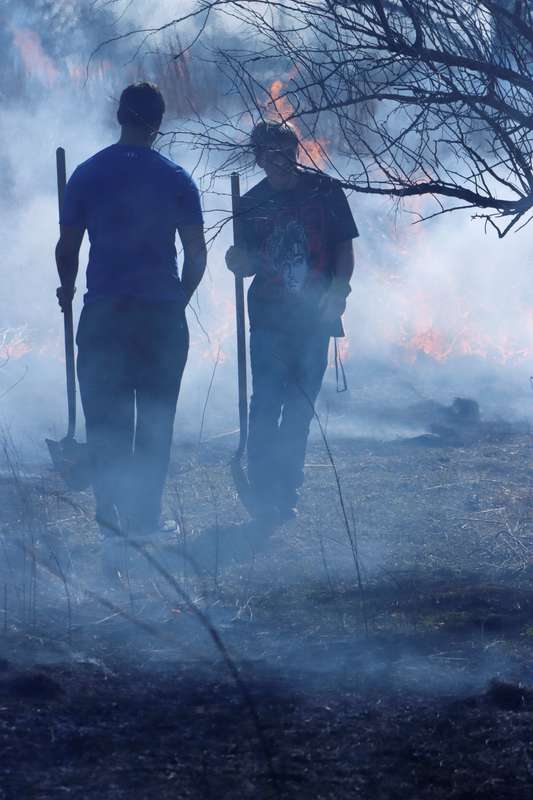 GHS Students and faculty moniter the annual burn off of the OWLS nature site.