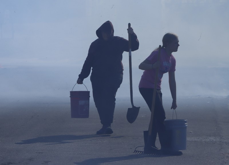 GHS Students and faculty moniter the annual burn off of the OWLS nature site.