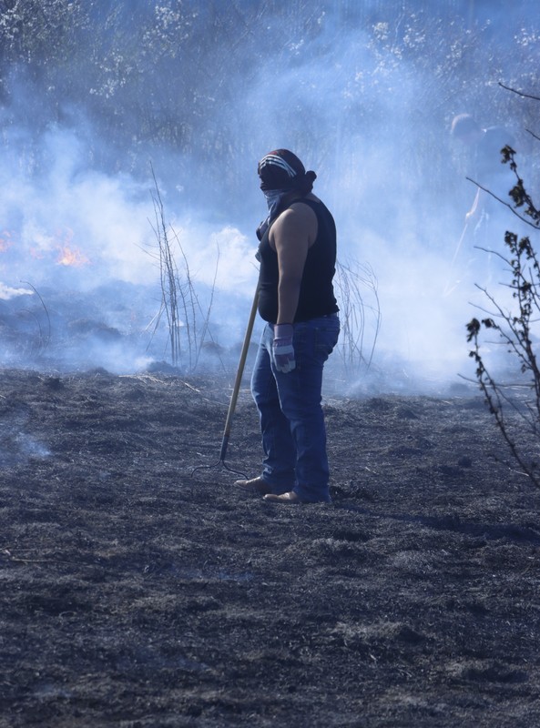 GHS Students and faculty moniter the annual burn off of the OWLS nature site.