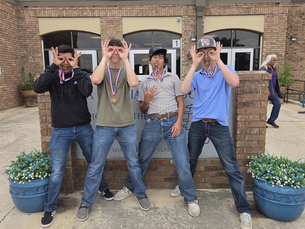 Being silly with their medals