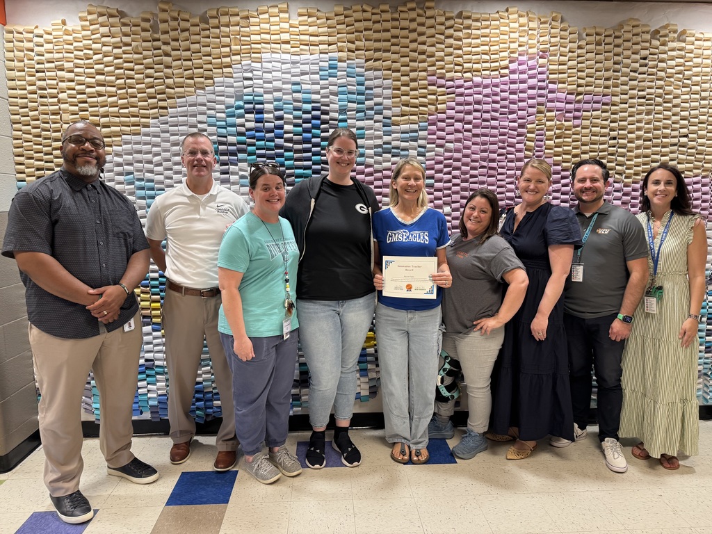 Group picture of Ms. Parks, ITCs, GRAETC rep, and admin team in GCPS