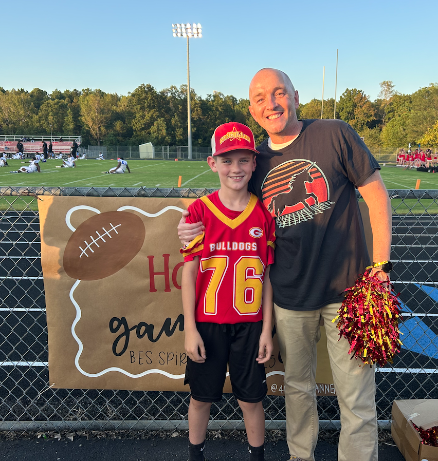 Mr. Meiller with students at BES spirit night