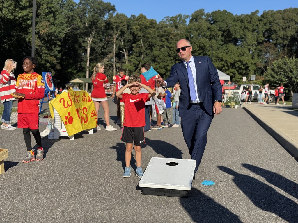 Dr. Armstrong throwing a bean bag